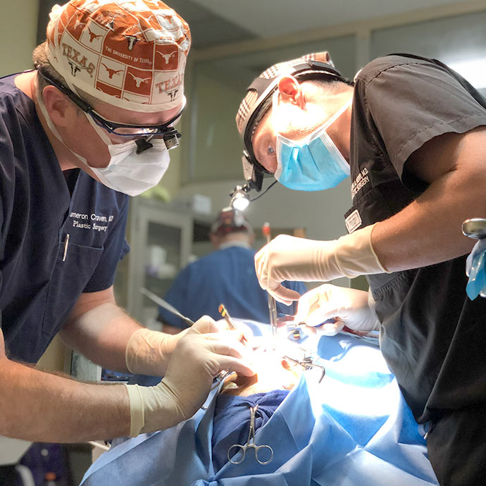 Dr. Craven and Dr. Kerr perform a cleft palate repair in El Salvador with Austin Smiles