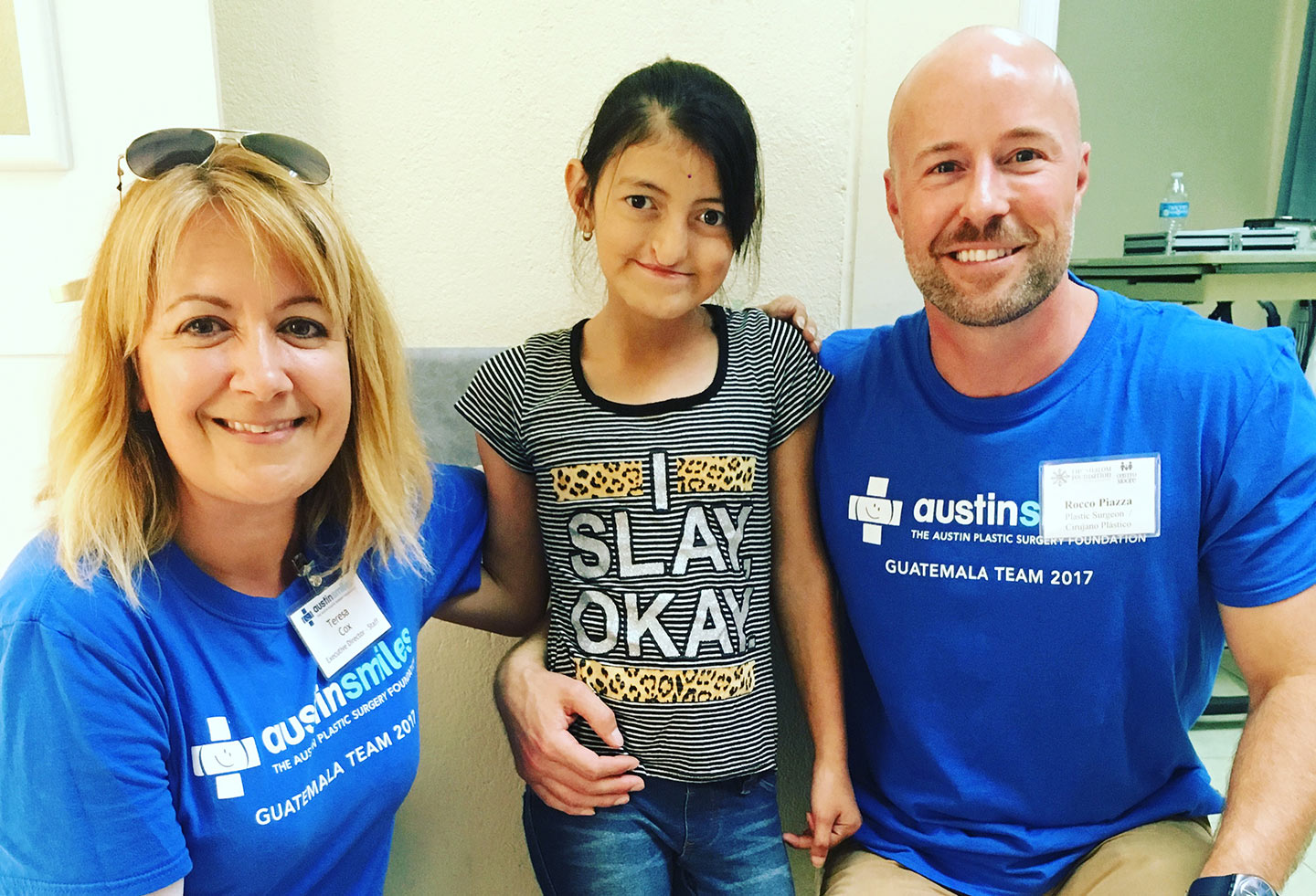 Teresa Cox, Executive Director of Austin Smiles, with a patient in Guatemala and Dr. Piazza